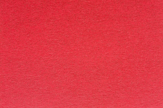 Roter Papierhintergrund mit zartem Muster. Hochwertiges Bild.