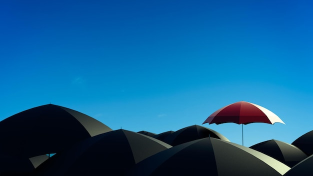 Roter Regenschirm, der sich von vielen schwarzen Regenschirmen abhebt. Führung, Unabhängigkeit, Initiative, Strategie, anders denken, Geschäftserfolgskonzept.