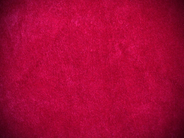 Roter Samtstoff als Hintergrund verwendet Leerer roter Stoffhintergrund aus weichem und glattem Textilmaterial Es gibt Platz für Text