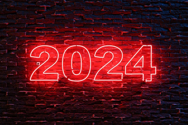 Rotes Neonschild 2024 an einer Ziegelwand