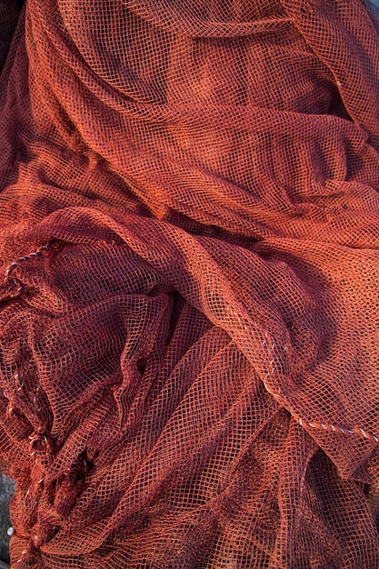 Rotes traditionelles Fischernetz Texturhintergrund