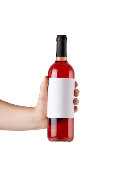 Rótulo branco em branco simulado na garrafa de vinho tinto na mão