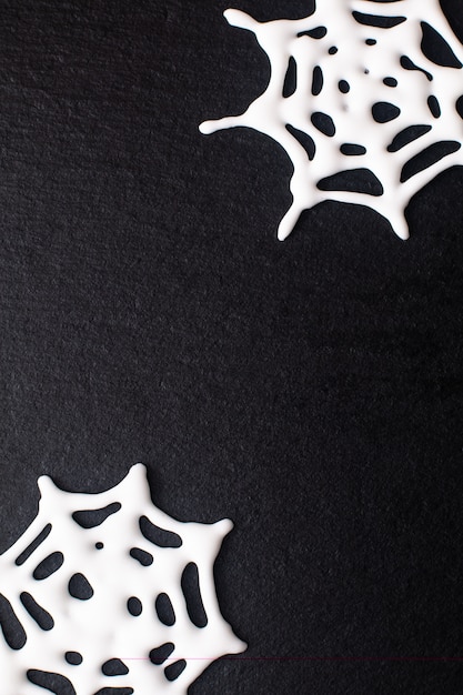 Royalonicing Spinnennetz des Lebensmittelhintergrundes für Halloween-Feiertag