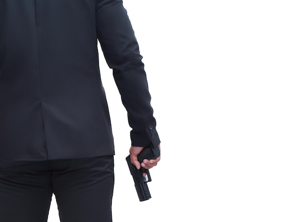 Rückansicht des Schützen im schwarzen Anzug mit Pistole auf weißem Hintergrund isoliert Konzept für Attentäter, Mord, Verbrecher, Banditen.