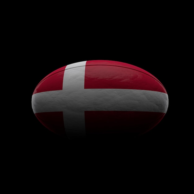 Rugbyball mit dänischer Flagge auf schwarzem Hintergrund