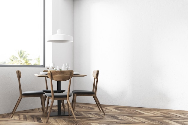 Runder Holztisch mit Stühlen daneben und einer stilvollen Deckenlampe darüber. Ein Café-Interieur. 3D-Rendering