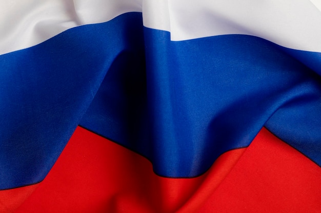 Russischer Hintergrund mit weißer, blauer und roter Flagge