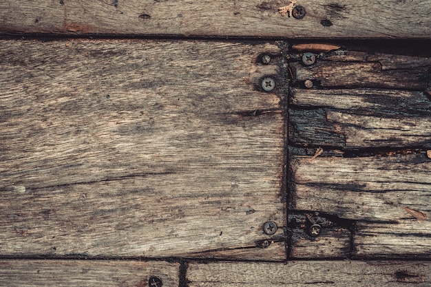 Rusty Metal Nails On Wooden Floor