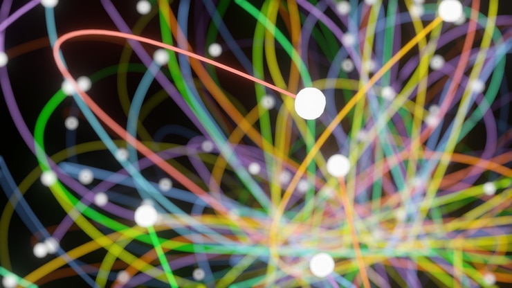 Foto ruta de electrones aleatorios coloridos alrededor del núcleo de un átomo representación 3d