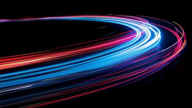 Rutas de luz en un fondo oscuro que muestran curvas luminosas azules y rojas