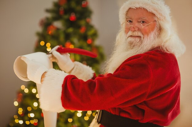 Sábado Papai Noel escrevendo lista