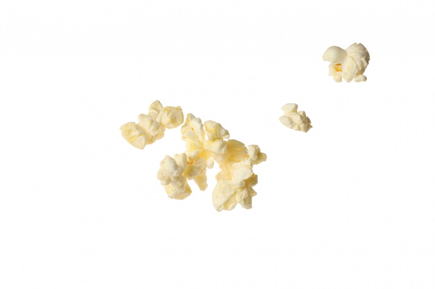 Foto sabrosas palomitas de maíz aislado en blanco. comida para cine