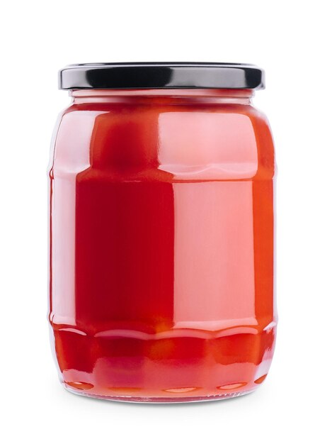 Sabroso ketchup en tarro de cristal aislado en blanco