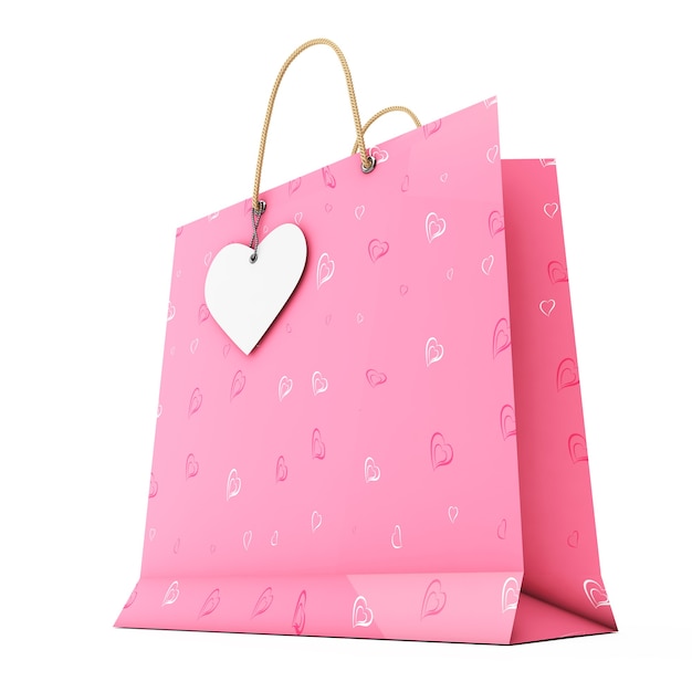 Foto saco de compra de papel rosa com etiqueta de coração branco na corda em um fundo branco. renderização 3d