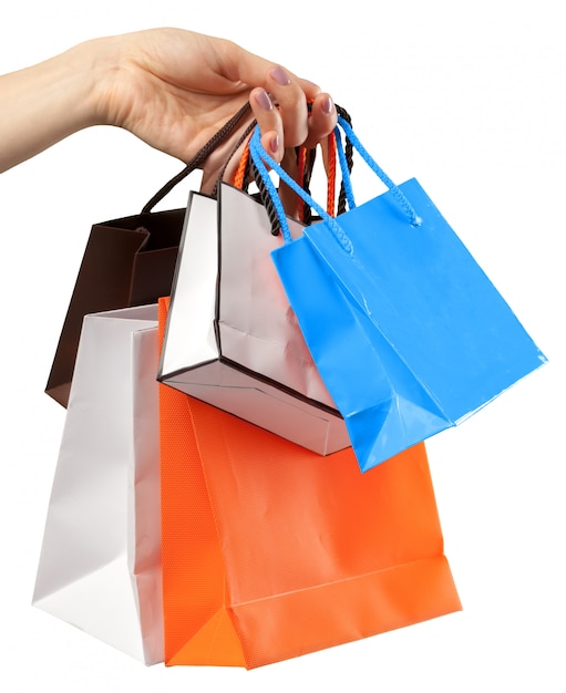 Saco de compras, feminino mão segurando o saco de compras em branco