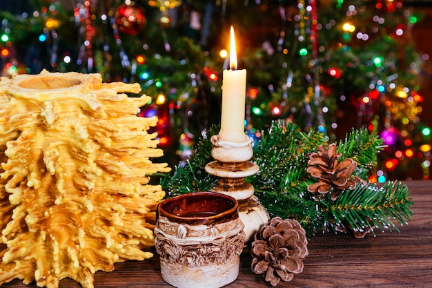 Sakotis año nuevo árbol y vela feliz navidad