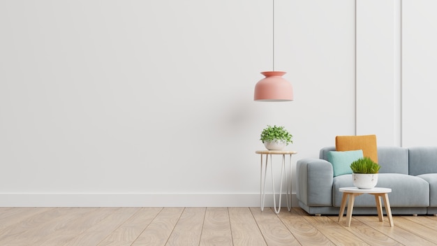 Sala de estar vazia com sofá azul, plantas e mesa no fundo da parede branca vazia. Renderização 3D