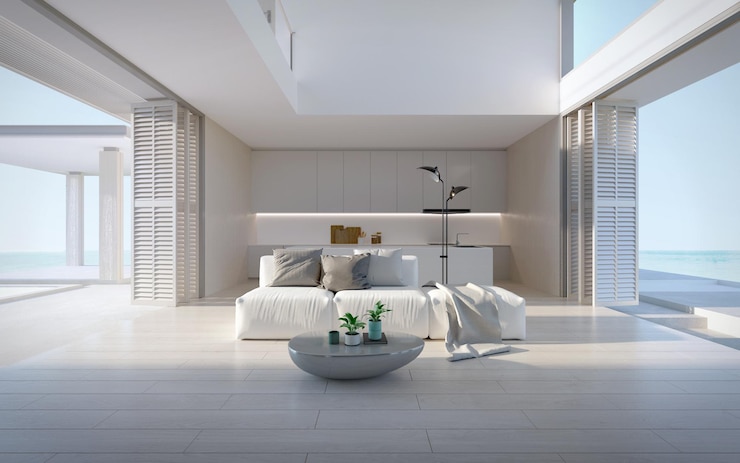 Sala de estar blanca casa de lujo de estilo moderno con sofá blanco suelo de madera y vistas al mar