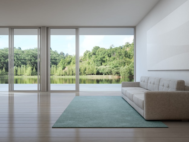 Foto sala de estar de casa de lujo con vista al lago en diseño moderno.