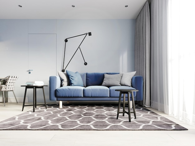Sala de estar de diseño nórdico con un moderno sofá azul y mesas auxiliares negras con decoración