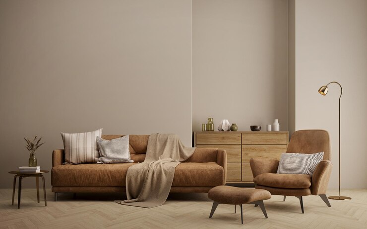 Sala de estar marrón con sofá, sillón, mesa y lámpara