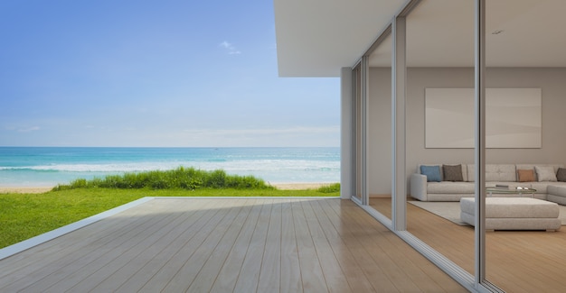 Sala de estar con terraza vacía en la moderna casa de playa de lujo