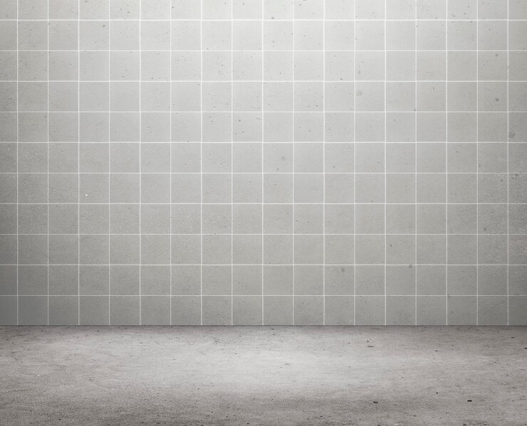 Foto sala vazia de piso de cimento com fundo cerâmico cinza