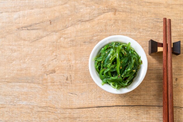 Salada de algas - estilo japonês de fundo