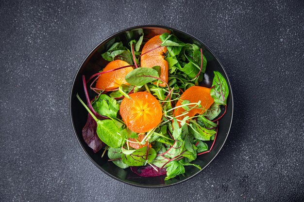 salada de frutas alface caqui folhas verdes misturar refeição saudável comida lanche na mesa espaço de cópia comida