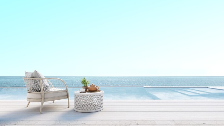 Salón de playa con piscina y vistas al mar
