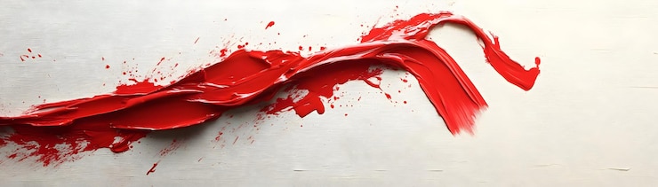 Foto las salpicaduras de pintura roja vibrante en el fondo blanco brillante forman la cinta del sida concepto de foto de stock dinámico