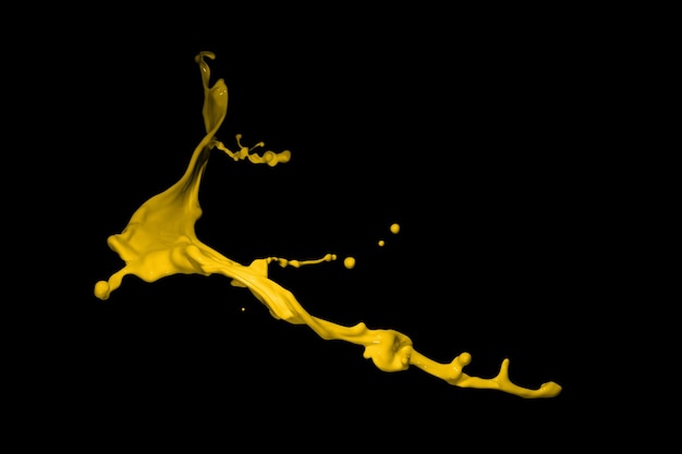 Salpicos de tinta amarela isolados em fundo preto