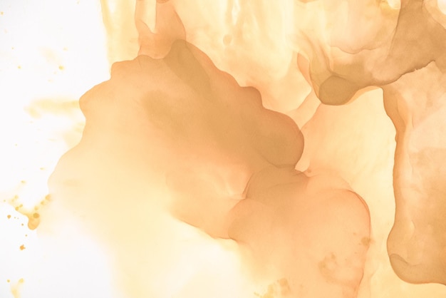 Salpicos marrons de tinta de álcool como fundo abstrato