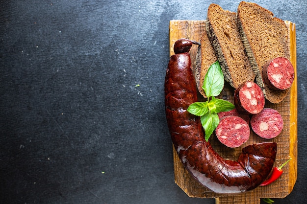 salsicha morcela comida gorda sangrenta na mesa refeição saudável lanche cópia espaço comida fundo