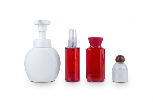 Sammlung der Plastikflasche der verschiedenen kosmetischen Hygienebehälter der Schönheit mit der Körperbefeuchtung lokalisiert auf Weiß