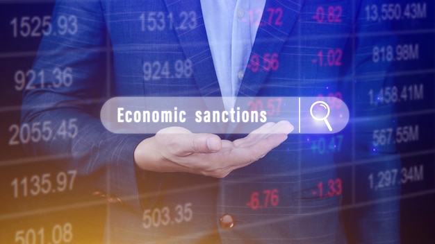 Sanções econômicas escritas na barra de pesquisa com os dados financeiros visíveis ao fundo Relatórios Palavras do Ticker do mercado de ações