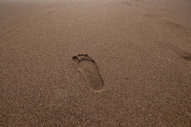 Sandstrand-Fußabdruck am Strand