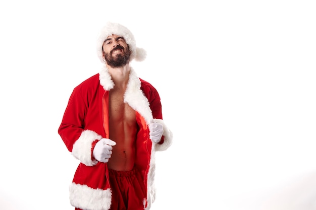 Santa Claus Bodybuilder zeigt seinen sexy athletischen Körper auf weißem Hintergrund