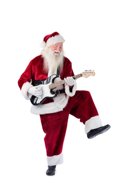 Santa Claus se divierte con una guitarra