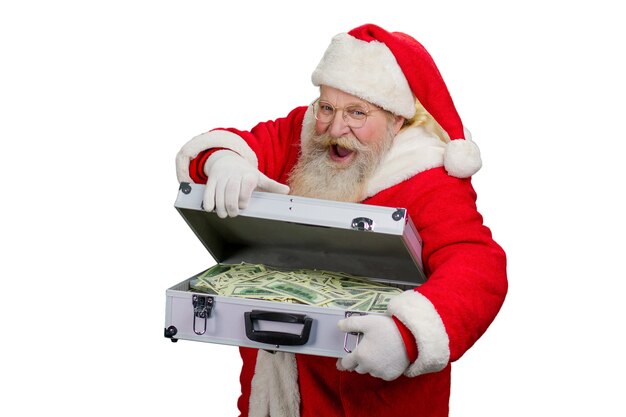 Santa Claus öffnet Koffer mit Geld.