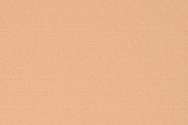 Sauberer und leerer orangefarbener Styropor-Polystyrol-Hintergrund oder -Textur