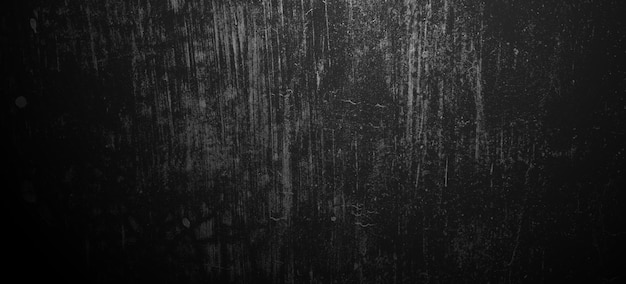 Scary black grunge goth design horror black background Scary paredes oscuras textura de cemento de hormigón negro ligeramente claro para el fondo