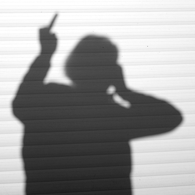 Foto schatten einer person an der wand