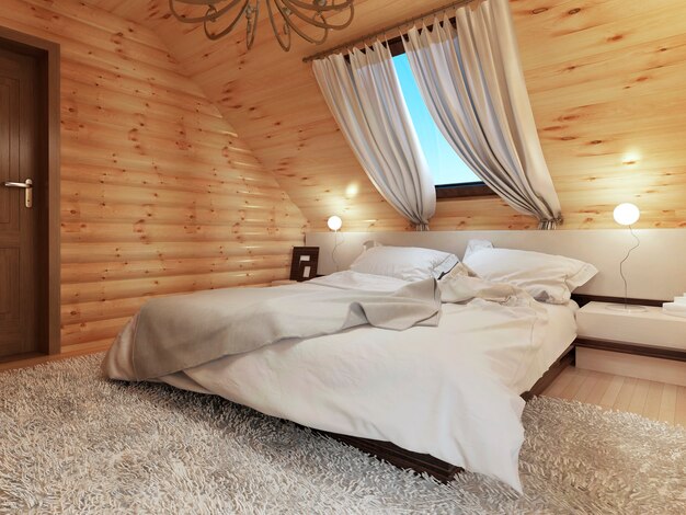 Schlafzimmer Interieur in einem Baumstamm auf dem Dachboden mit einem Dachfenster