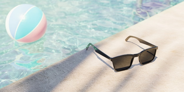 Schließen Sie oben von der Sonnenbrille am Rand eines Pools mit Wasser und Kugel im Hintergrund unscharf