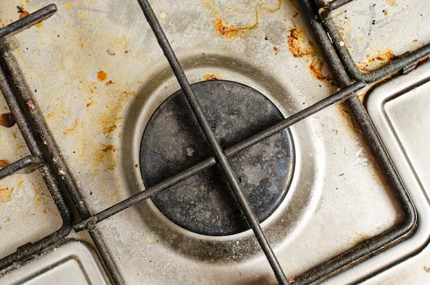 Schmutziger Gasherd Das Konzept der Reinigung in der Küche