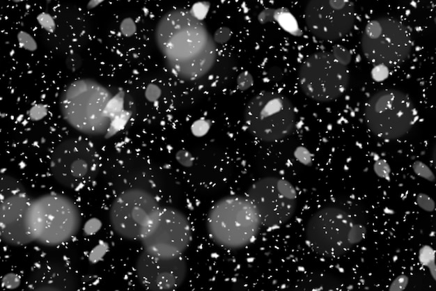 Schneeflocken auf schwarzem Hintergrund