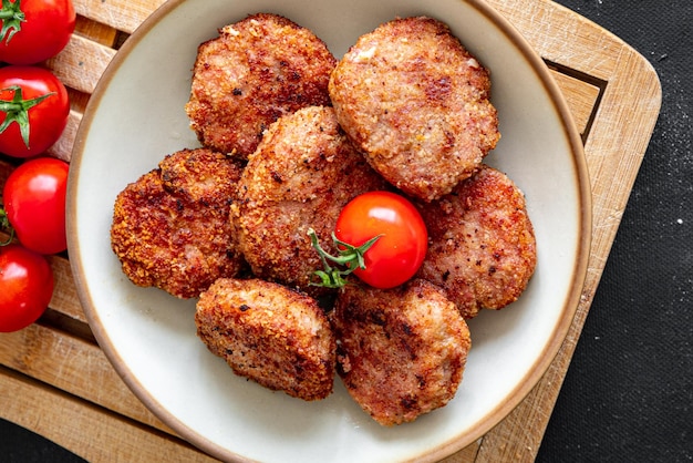 Schnitzel Fleisch Schweinefleisch Rindfleisch Huhn frische Mahlzeit Lebensmittel Snack Homrmade auf dem Tisch Kopie Raum Essen