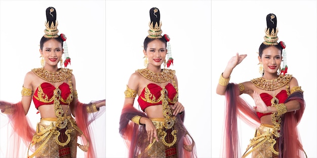 Schöne asiatische Frau trägt thailändisches traditionelles Kostüm als thailändisches nationales Hochzeitskleid mit goldenen dekorativen Modeartikeln weißer Hintergrund isolierter halber Körper