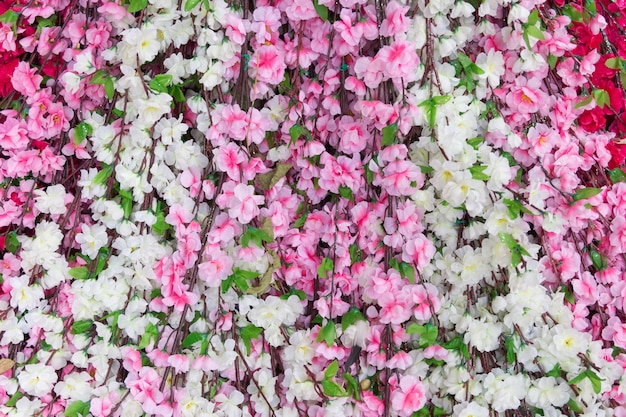 Schöne künstliche Blumen für Hintergrund